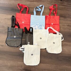 Lot of 8 Reusable Lululemon Tote Bags in Black, Red, Blue, and Cream ALL NEW